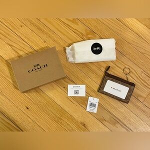 Brand new with tags and box- Coach mini wallet- great gift